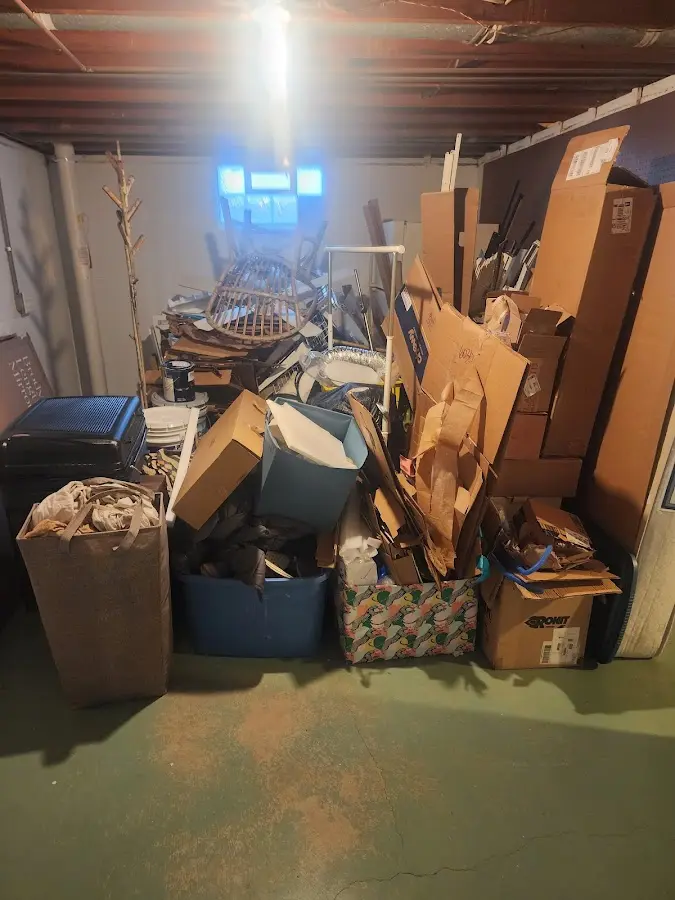 Roll-off dumpster container at job site for 2 Yard Dumpster Rental in South Boston